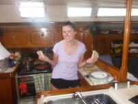 Katy cooking in the galley